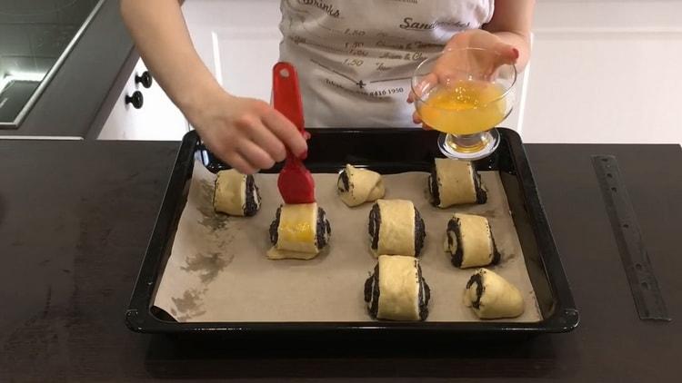 Preheat oven to make yeast buns with poppy seeds
