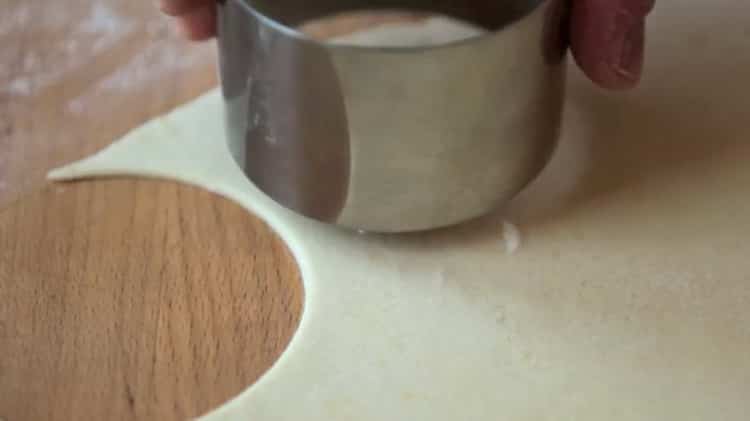 To make dumplings with mushrooms, roll out the dough