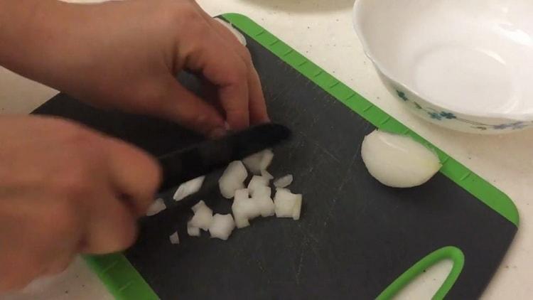 To make dumplings with potatoes and lard, chop the onion