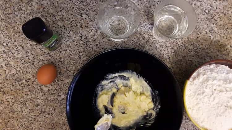 Beat eggs to make raw potato dumplings.