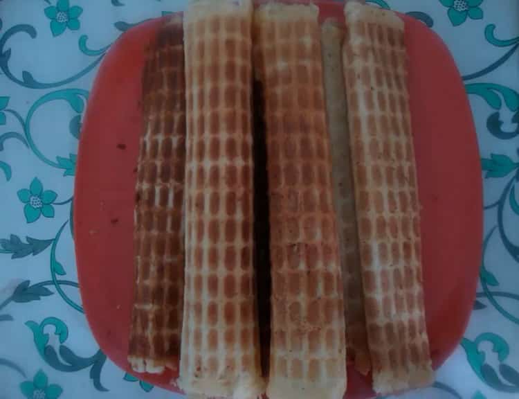 waffles in a waffle iron crispy on margarine ready