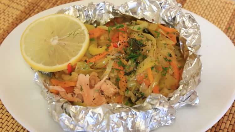 Oven baked pink salmon with vegetables in the oven foil