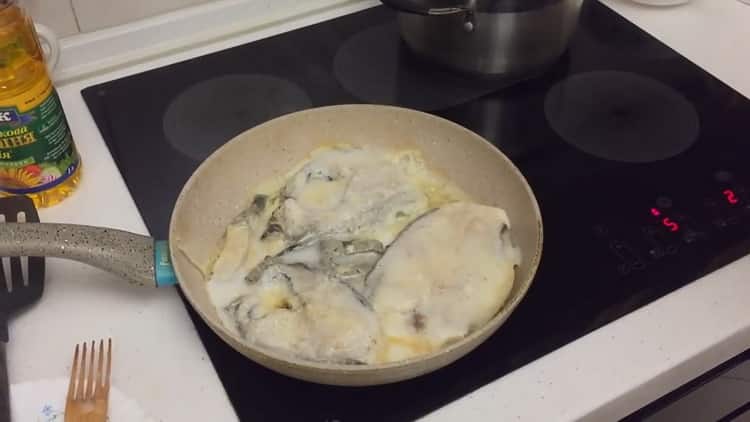 To cook catfish steak in a pan, fry the fish