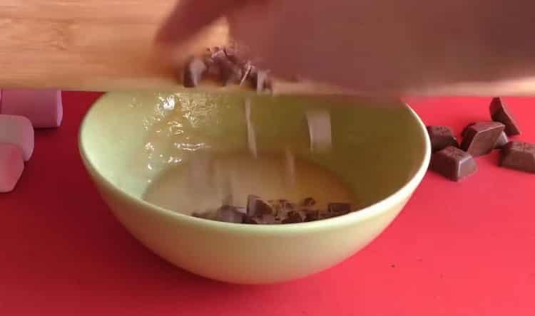 To make a cupcake in the microwave, chop the chocolate