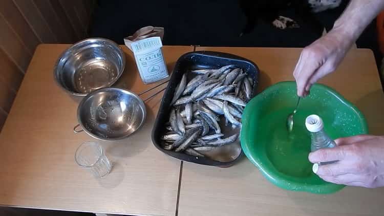 Rinse fish to make dried smelt