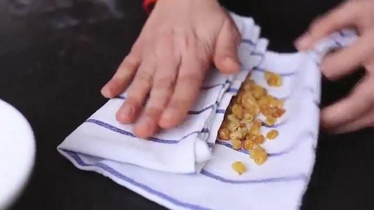 To make a cake in a bread machine, drain the raisins