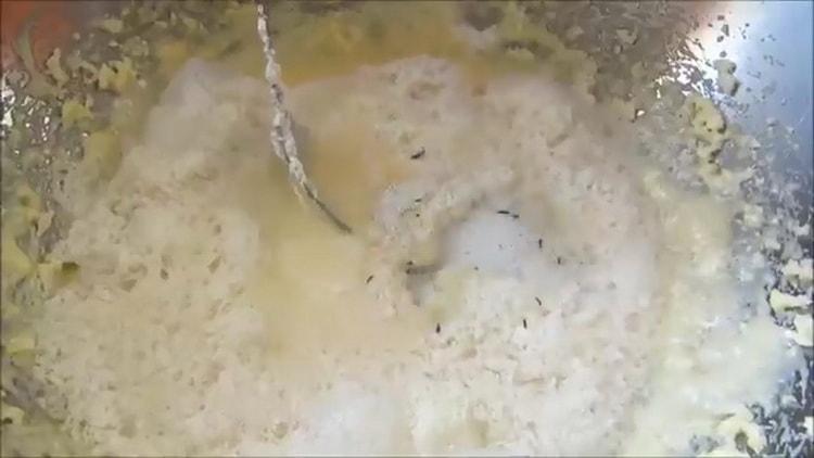 Sift flour to make Easter cake