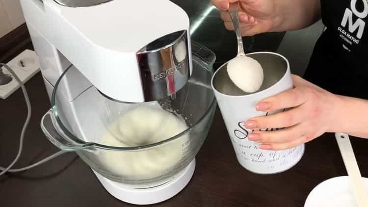 To make a cake in a slow cooker, prepare the icing