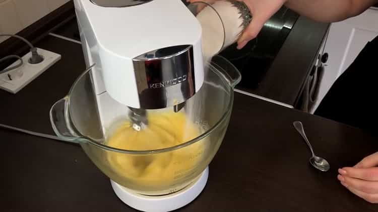 To cook a cake in a slow cooker, beat the eggs