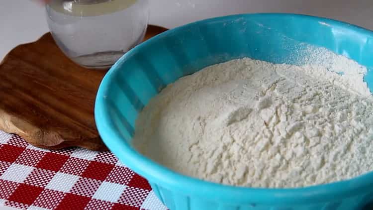 To make flour tortillas in a pan, sift the flour
