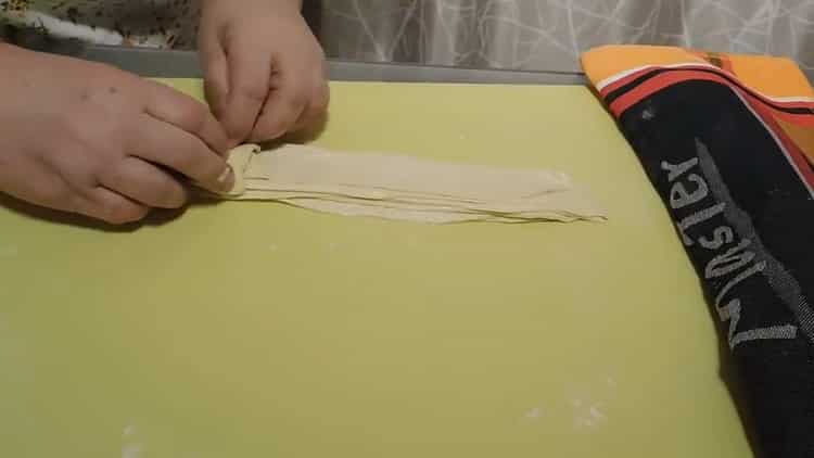 To make flat cakes on water, roll the dough