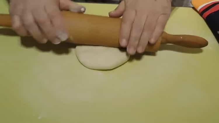 To make flat cakes on water, roll out the dough