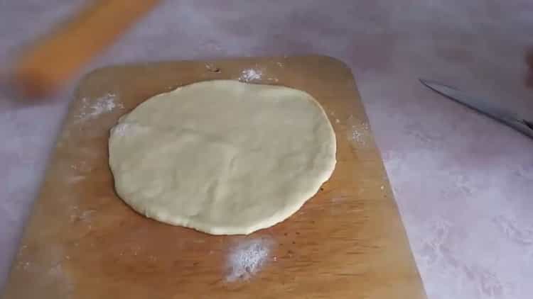 To make flat cakes on brine, roll out the dough