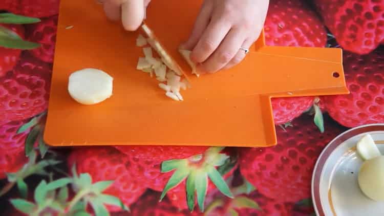 Cooking pasta with mushrooms in a creamy sauce