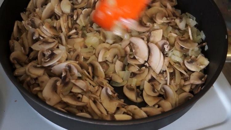 To cook, fry the mushrooms