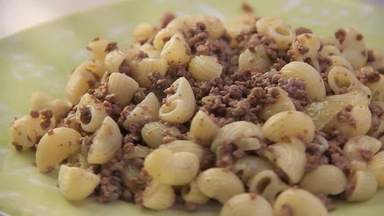 pasta with minced meat in a pan ready