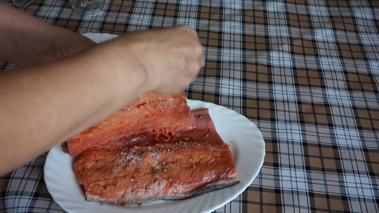 To prepare salted pink salmon, salt the fish
