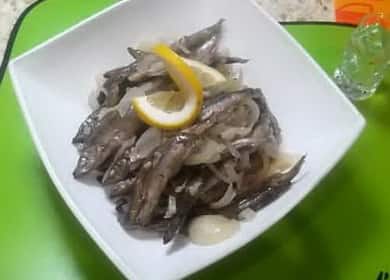 Braised capelin with onions in a pan according to a step by step recipe with photo