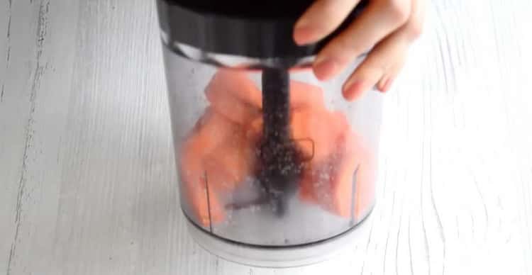 Delicious carrot cupcakes with cream cheese, chop carrots