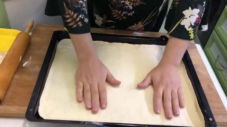 To make puff pastry baklava, prepare a baking sheet