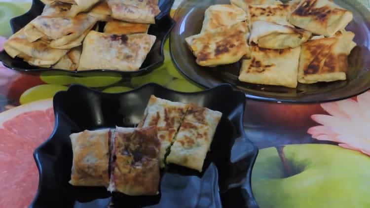 lavash pies in a pan are ready