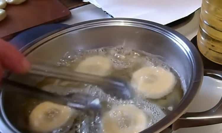 To make donuts, heat oil