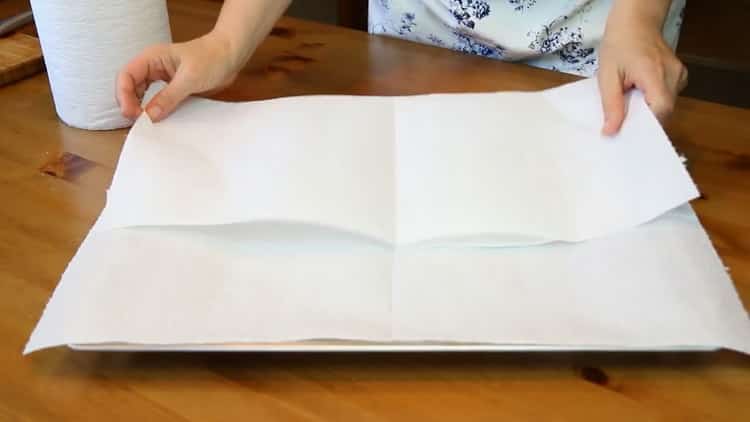 To make donuts on condensed milk, prepare a baking sheet