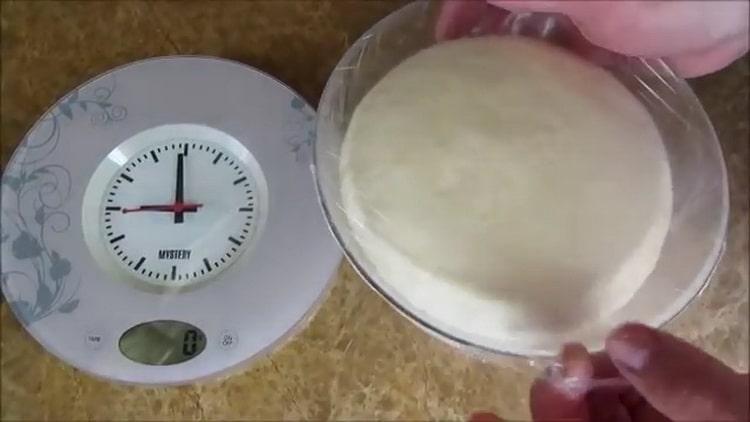According to the recipe, to cook white bread in the oven, let the dough stand