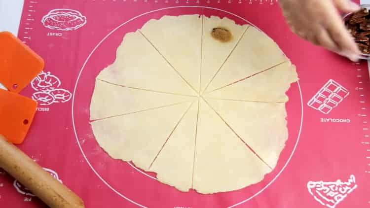 To make puff pastry bagels, cut the dough