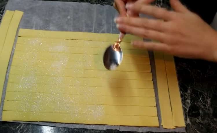 To make puff pastry roses, sprinkle the dough with sugar