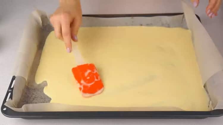 To make a roll with red fish, put the dough on paper