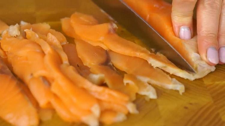 To make red fish roll, cut the fish