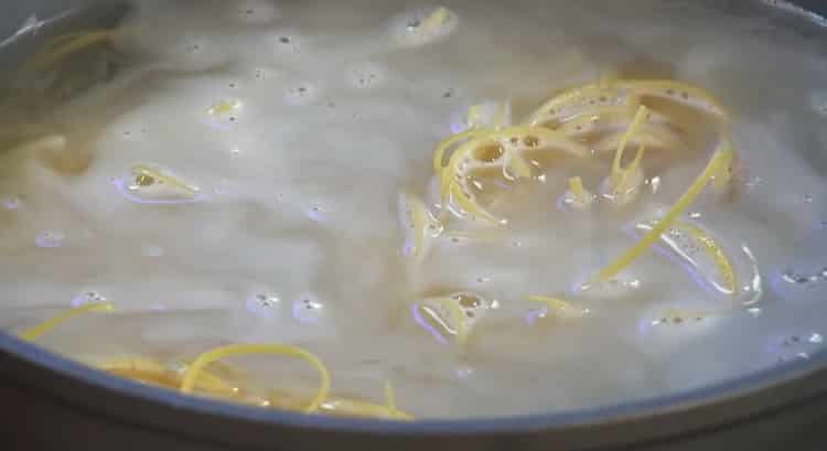 To cook pork with pasta, boil noodles