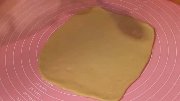 Roll out the dough to make buns.