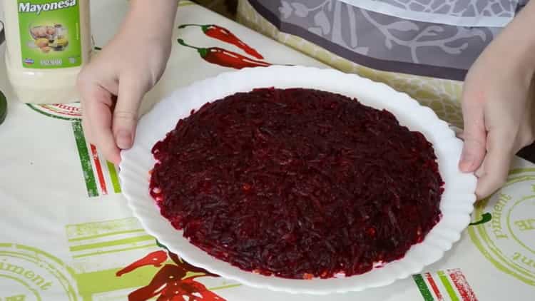 To cook herring under a fur coat, rub the beets