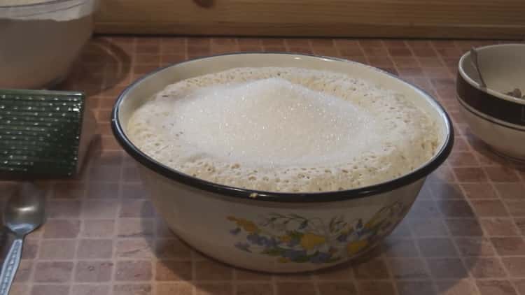 Knead the dough according to the recipe for making an ancient Easter cake