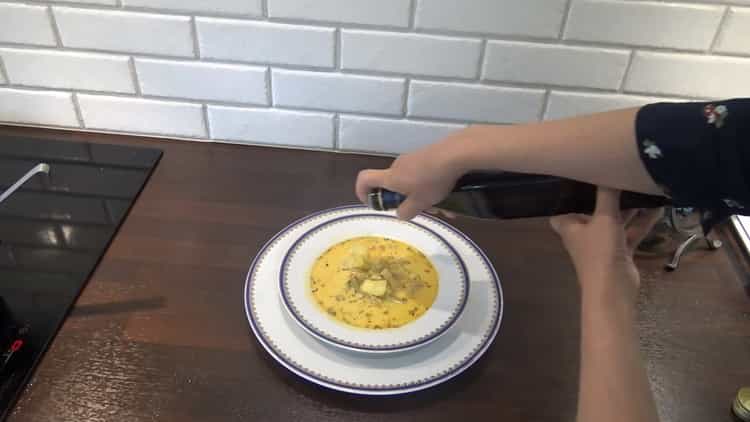 Add wine to make cod soup