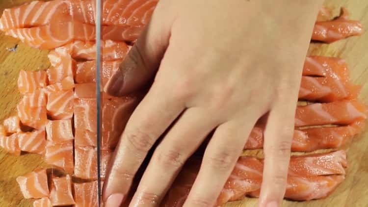 To make salmon tartare, cut the fish