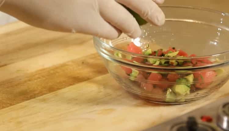 Squeeze lime to make tuna tartare