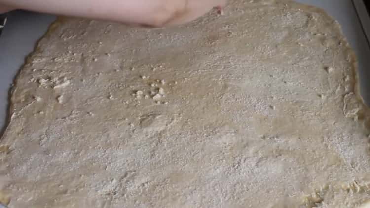 To prepare the dough for buns with dry yeast, oil the dough