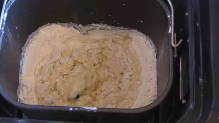 To prepare the dough for the pastries in the baker, add flour