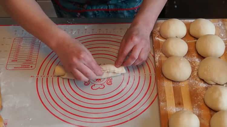 To make buns, twist the dough into a tube
