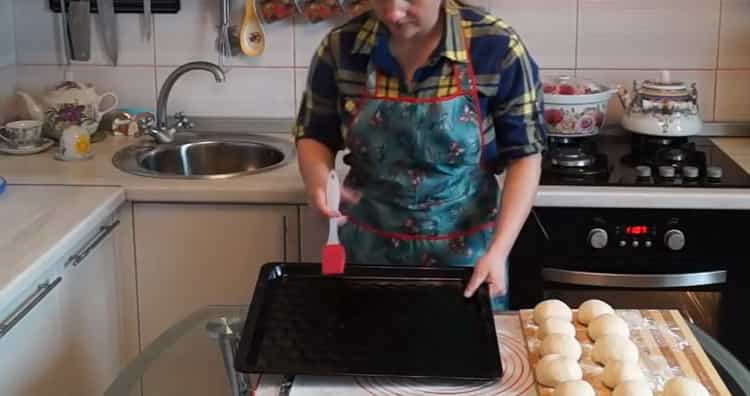 To make buns, grease a baking sheet