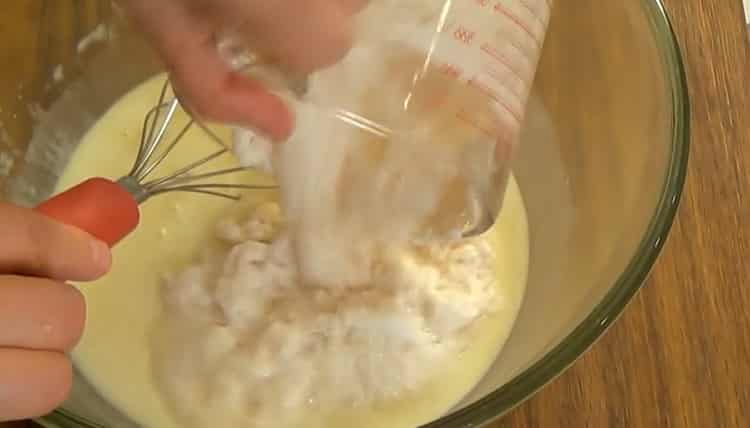 To prepare the dough on sour cream for pies, sift the flour