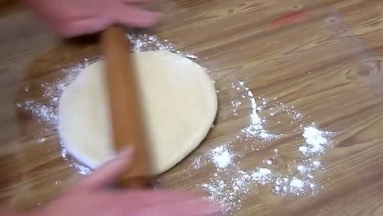 Roll out the dough to make French buns