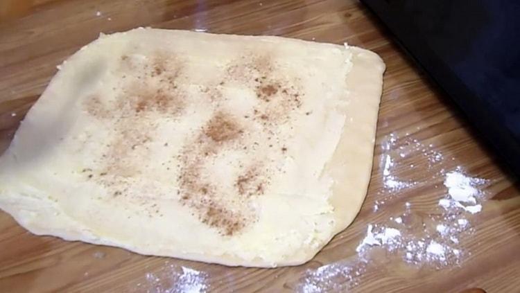 To make French buns, butter the dough