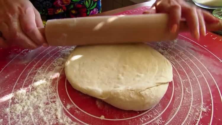 To make khachapuri in a pan, roll out the dough