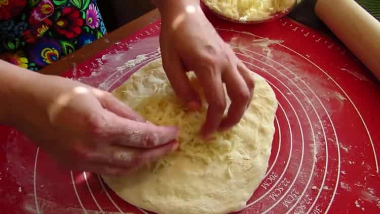 To prepare khachapuri in a pan, put the filling on the dough