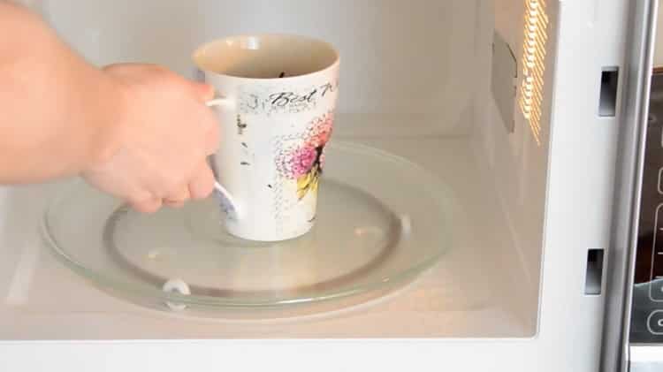 To prepare a chocolate muffin in a microwave, prepare a microwave