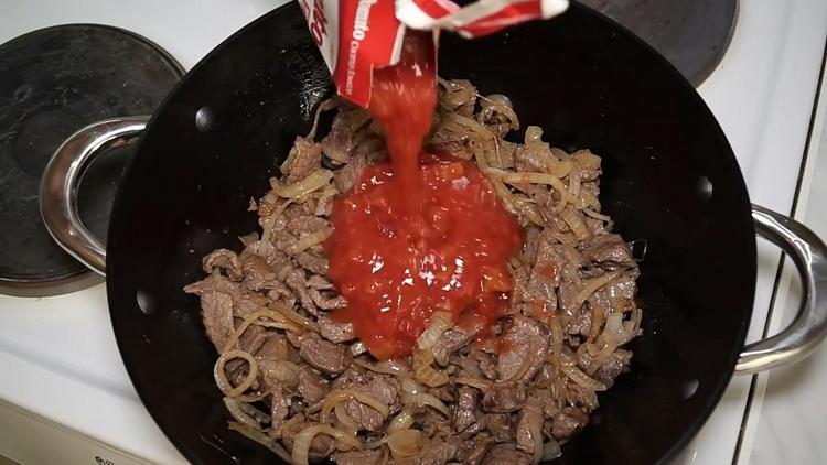 Add tomato paste to cook